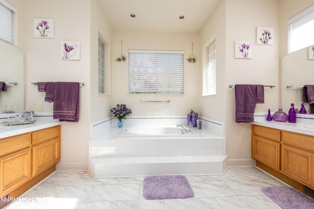 2080 St George Way, Carson City, NV 89703 - bathroom featuring marble finish flooring, vanity, and a bath