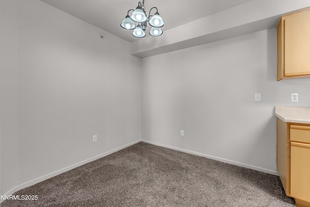 6850 Sharlands Ave Unit Ac2179, Reno, NV 89523 - unfurnished dining area with carpet, a chandelier, and baseboards