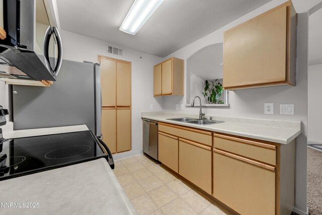 6850 Sharlands Ave Unit Ac2179, Reno, NV 89523 - kitchen featuring a sink, appliances with stainless steel finishes, light countertops, and light brown cabinets