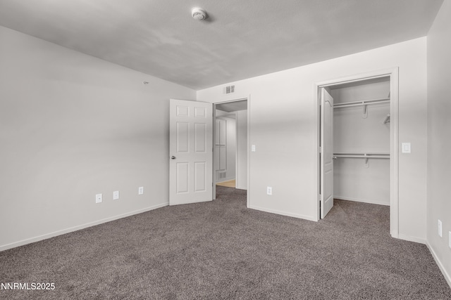 6850 Sharlands Ave Unit Ac2179, Reno, NV 89523 - unfurnished bedroom with carpet flooring, baseboards, a walk in closet, and a closet