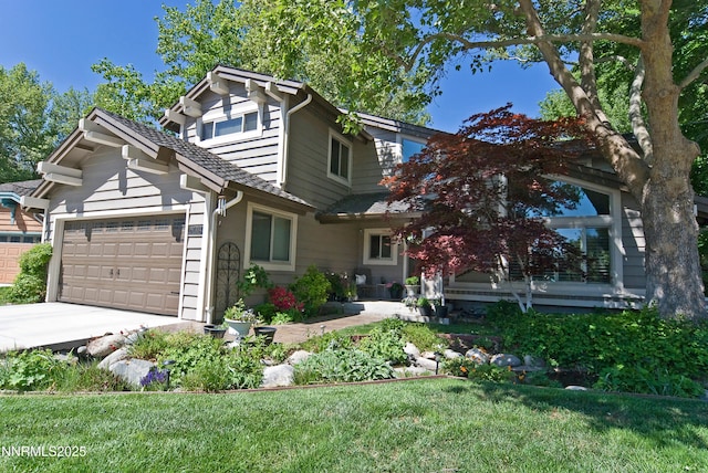 4115 Willowsprings Ct, Reno, NV 89519 - view of front of home with an attached garage, concrete driveway, and a front lawn