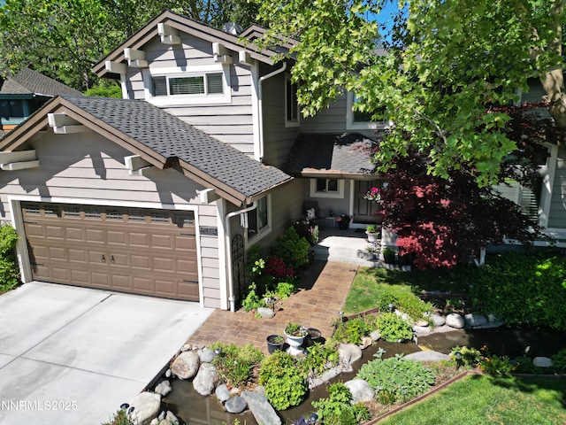 4115 Willowsprings Ct, Reno, NV 89519 - view of front of home featuring an attached garage, concrete driveway, and a shingled roof