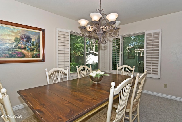 4115 Willowsprings Ct, Reno, NV 89519 - dining area featuring a chandelier, baseboards, and carpet flooring