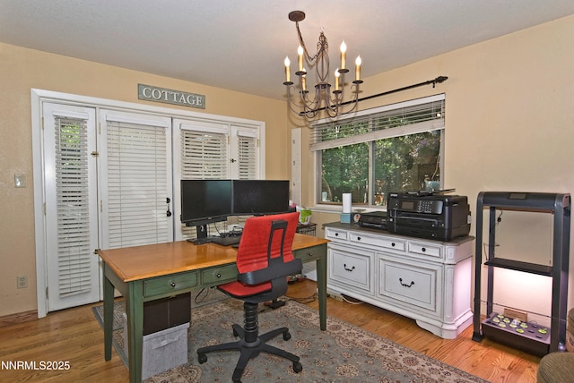4115 Willowsprings Ct, Reno, NV 89519 - home office with a chandelier, wood finished floors, and baseboards