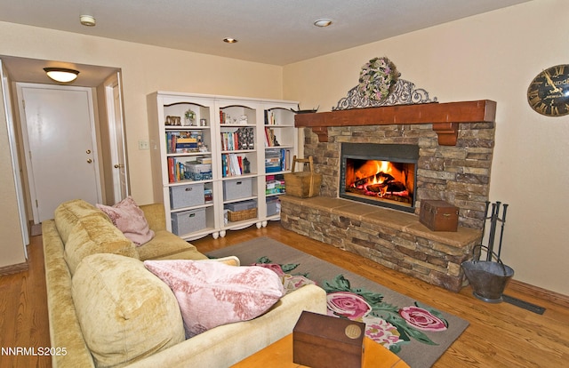 4115 Willowsprings Ct, Reno, NV 89519 - living area featuring wood finished floors, a fireplace, and baseboards