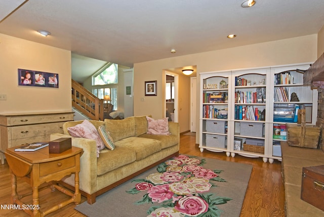4115 Willowsprings Ct, Reno, NV 89519 - living area featuring wood finished floors, stairway, and recessed lighting