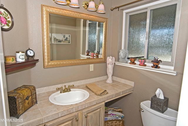 4115 Willowsprings Ct, Reno, NV 89519 - half bathroom with vanity and toilet