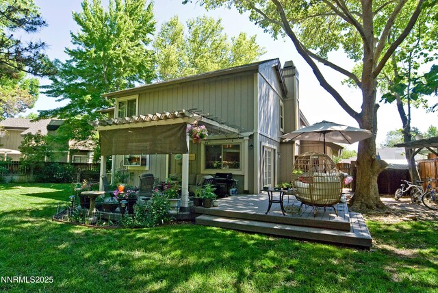4115 Willowsprings Ct, Reno, NV 89519 - rear view of property featuring a chimney, a wooden deck, and a pergola