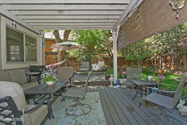 4115 Willowsprings Ct, Reno, NV 89519 - wooden deck featuring a pergola, outdoor dining area, and a fenced backyard