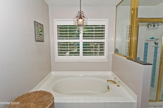 4115 Willowsprings Ct, Reno, NV 89519 - full bathroom featuring a garden tub, a stall shower, and a chandelier