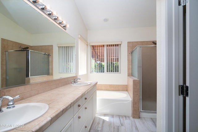 637 Donner Pass Ct, Sparks, NV 89436 - bathroom featuring a bath, a shower stall, and double vanity