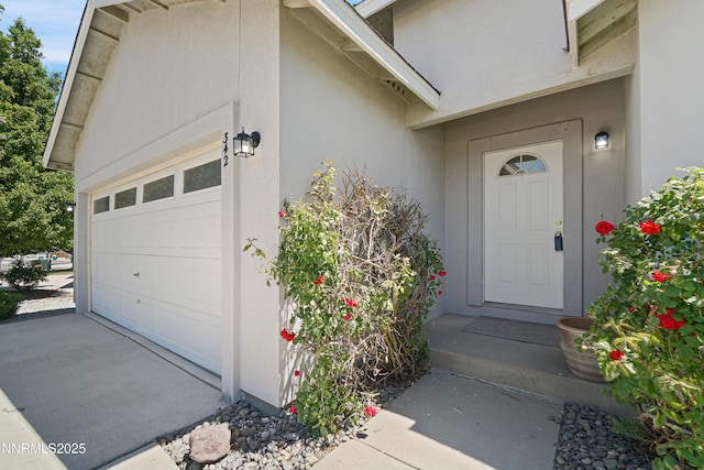 342 Bens Way, Fernley, NV 89408 - view of exterior entry with stucco siding and concrete driveway