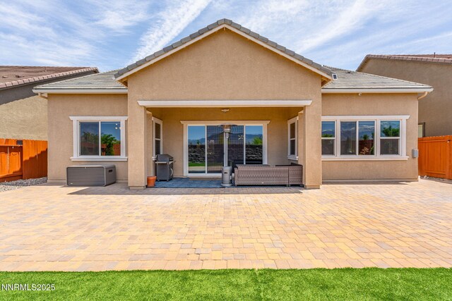 9425 Stony Hill Rd, Reno, NV 89521 - rear view of house with a patio area and stucco siding