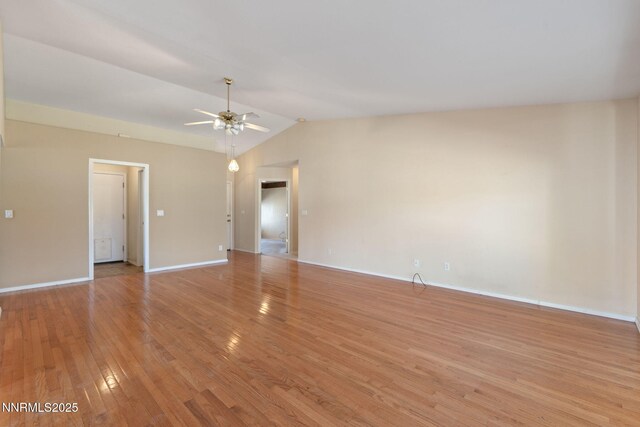 439 Beau Ct, Sparks, NV 89436 - empty room with a ceiling fan, lofted ceiling, light wood-style floors, and baseboards
