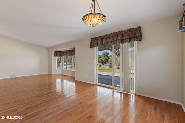 439 Beau Ct, Sparks, NV 89436 - spare room featuring light wood-style floors and baseboards