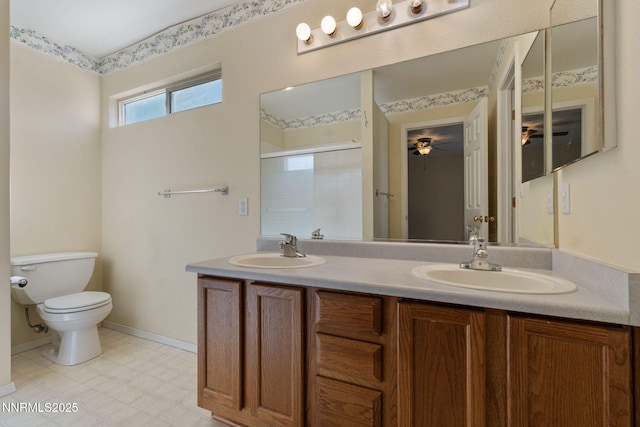 439 Beau Ct, Sparks, NV 89436 - bathroom featuring toilet, a shower stall, double vanity, a ceiling fan, and baseboards