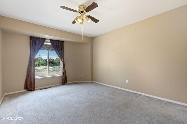 439 Beau Ct, Sparks, NV 89436 - spare room featuring carpet, baseboards, and a ceiling fan