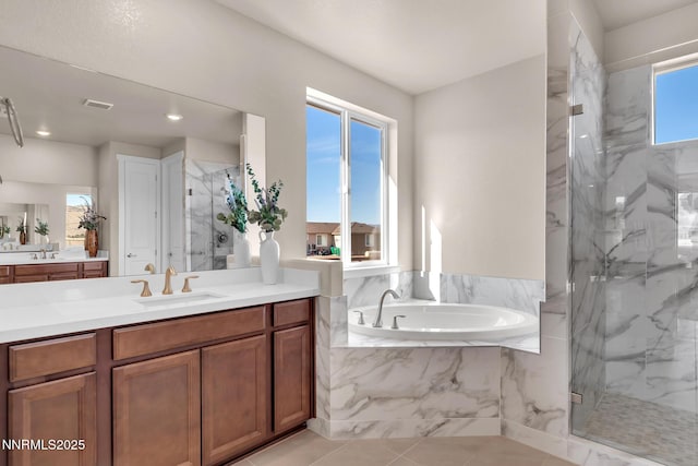 255 Pinto Ranch Ct, Reno, NV 89510 - full bathroom featuring a marble finish shower, vanity, a bath, tile patterned floors, and recessed lighting