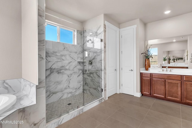 255 Pinto Ranch Ct, Reno, NV 89510 - full bath with a marble finish shower, vanity, a bath, tile patterned flooring, and recessed lighting