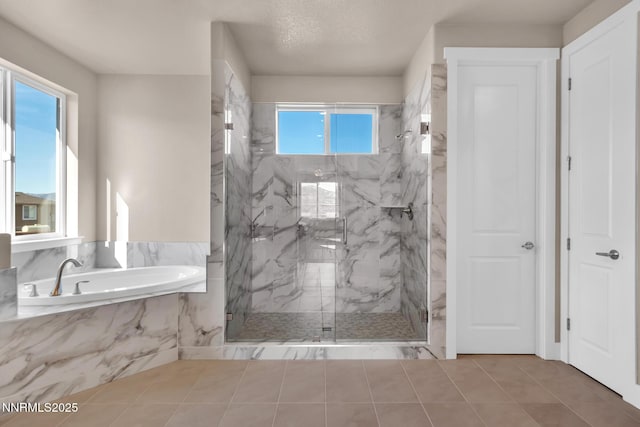 255 Pinto Ranch Ct, Reno, NV 89510 - bathroom featuring a bath, a marble finish shower, and tile patterned flooring