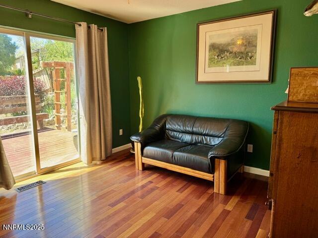 3205 Kingsview Ct, Reno, NV 89512 - sitting room featuring wood finished floors and baseboards