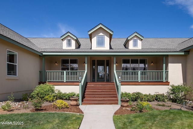 615 Oxbow Ct, Reno, NV 89511 - property entrance featuring a porch, stucco siding, and roof with shingles