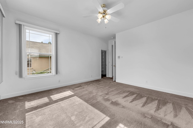 615 Oxbow Ct, Reno, NV 89511 - empty room featuring carpet flooring, baseboards, and a ceiling fan