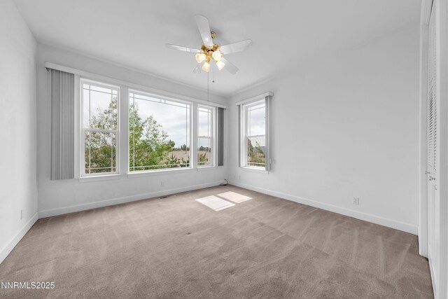 615 Oxbow Ct, Reno, NV 89511 - empty room with carpet floors, baseboards, and ceiling fan