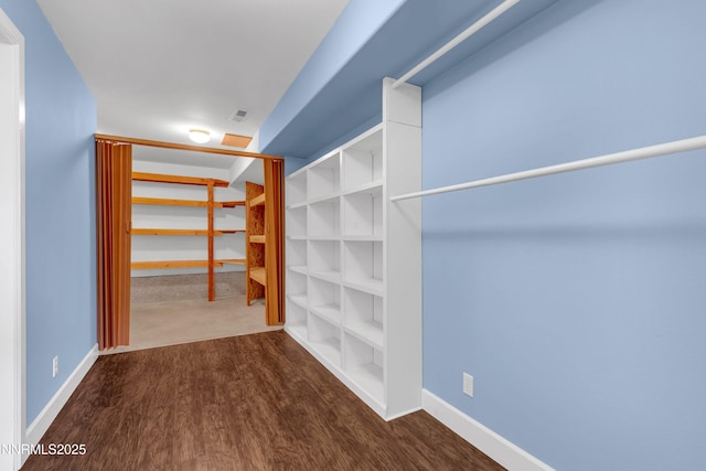 615 Oxbow Ct, Reno, NV 89511 - spacious closet featuring wood finished floors