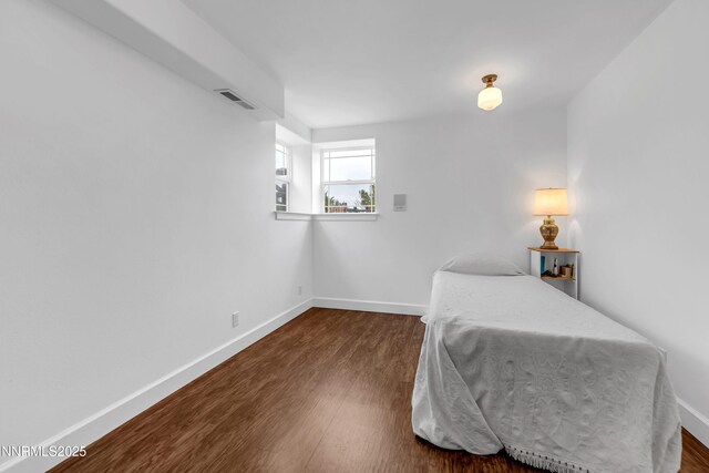 615 Oxbow Ct, Reno, NV 89511 - bedroom with dark wood finished floors and baseboards