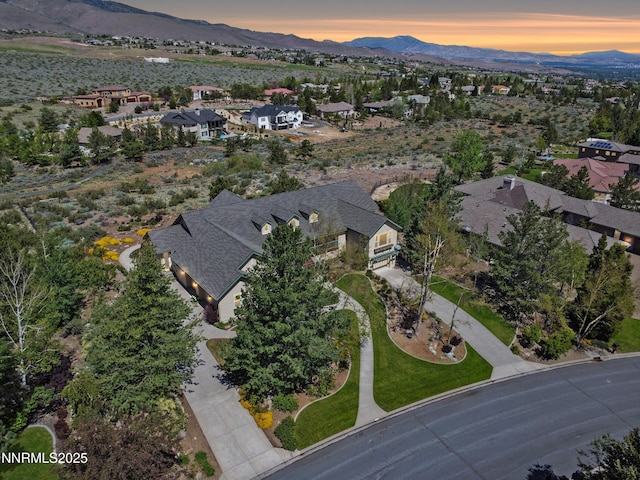 615 Oxbow Ct, Reno, NV 89511 - aerial view of property and surrounding area featuring a mountainous background and nearby suburban area