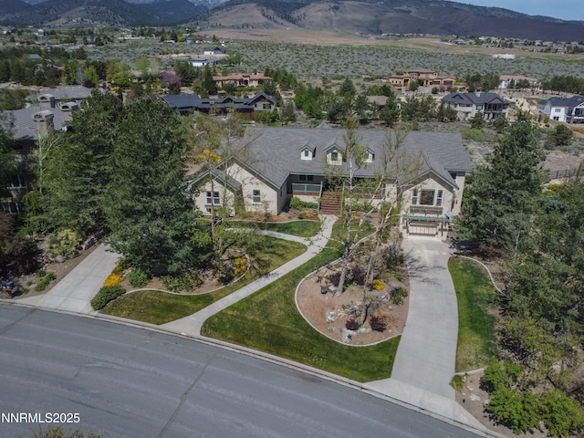 615 Oxbow Ct, Reno, NV 89511 - aerial view of property and surrounding area with mountains and nearby suburban area