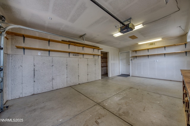 615 Oxbow Ct, Reno, NV 89511 - garage featuring a garage door opener