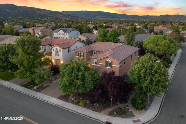 400 Sondrio Ct, Reno, NV 89521 - aerial overview of property's location featuring nearby suburban area and a mountain backdrop
