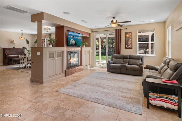 400 Sondrio Ct, Reno, NV 89521 - living area featuring ceiling fan and a glass covered fireplace