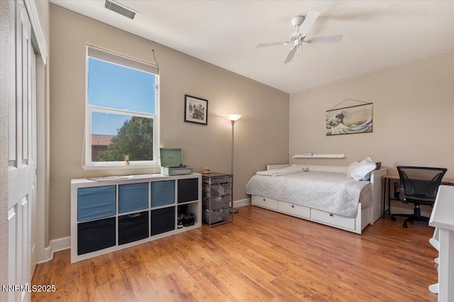 400 Sondrio Ct, Reno, NV 89521 - bedroom with light wood-type flooring, a ceiling fan, and baseboards