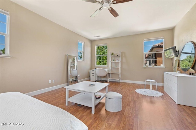 400 Sondrio Ct, Reno, NV 89521 - bedroom with wood finished floors, baseboards, and ceiling fan