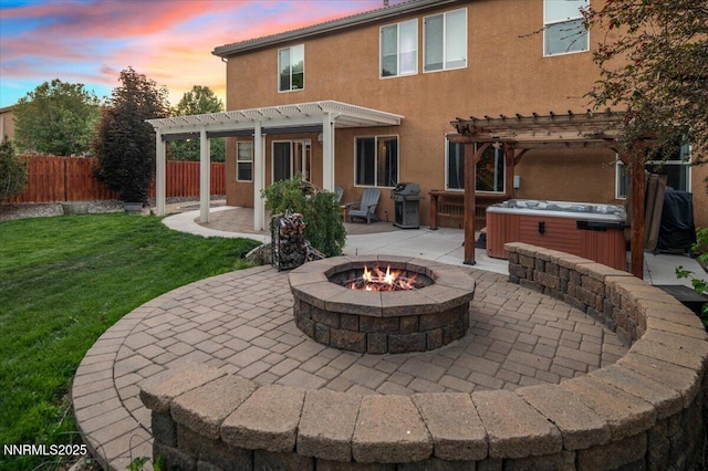 400 Sondrio Ct, Reno, NV 89521 - back of house with a fire pit, a pergola, a patio, and a hot tub