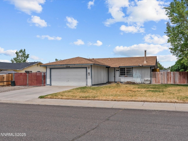 1344 Patricia Dr, Gardnerville, NV 89460 - ranch-style house featuring a garage and driveway