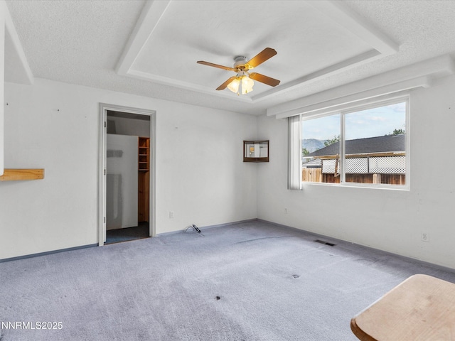 1344 Patricia Dr, Gardnerville, NV 89460 - carpeted spare room with a raised ceiling and a ceiling fan