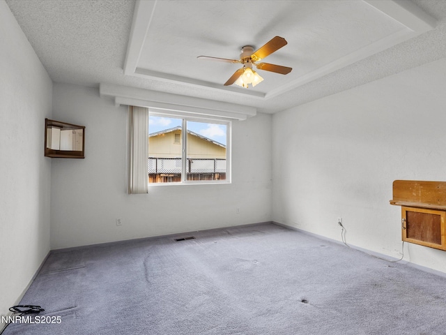 1344 Patricia Dr, Gardnerville, NV 89460 - unfurnished room featuring carpet flooring, a tray ceiling, and ceiling fan