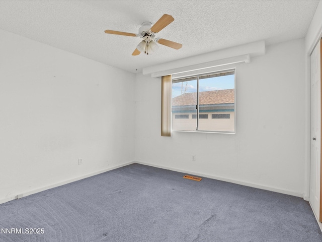 1344 Patricia Dr, Gardnerville, NV 89460 - carpeted empty room with ceiling fan, a textured ceiling, and baseboards