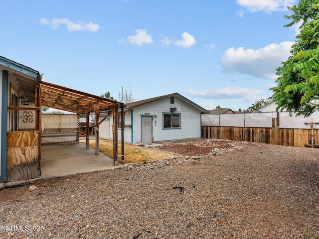 1344 Patricia Dr, Gardnerville, NV 89460 - back of property featuring a patio and a pergola