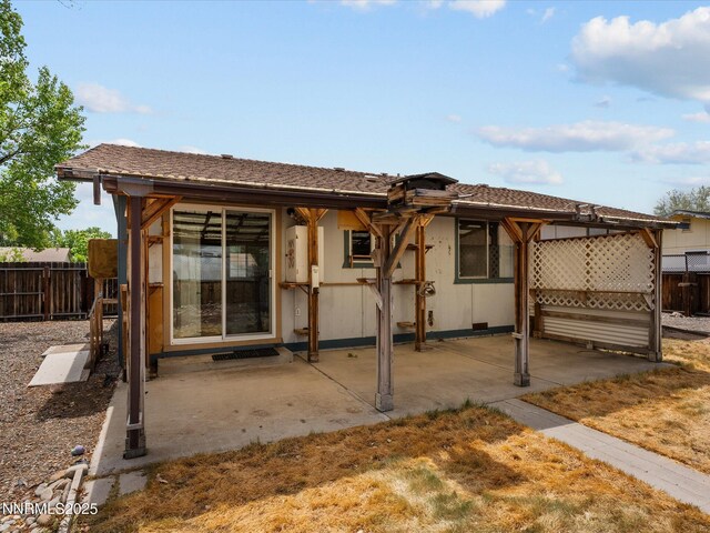 1344 Patricia Dr, Gardnerville, NV 89460 - back of house with a patio