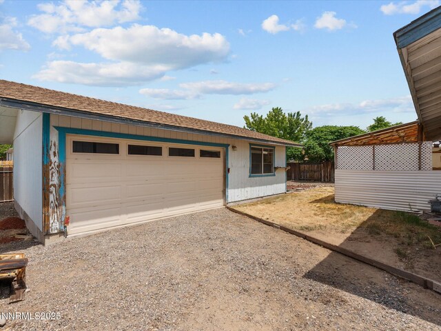 1344 Patricia Dr, Gardnerville, NV 89460 - garage with dirt driveway
