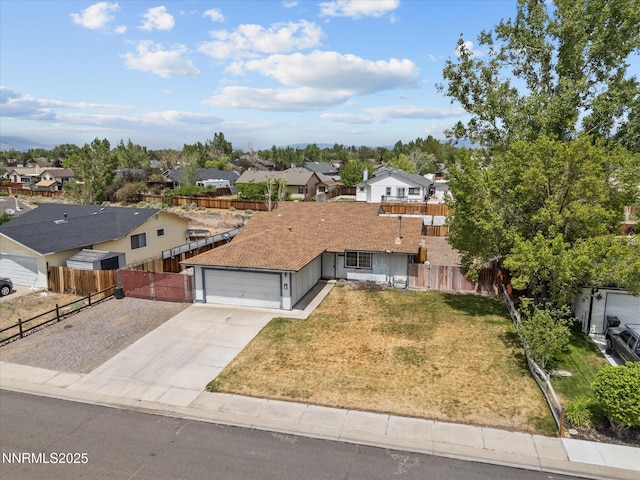 1344 Patricia Dr, Gardnerville, NV 89460 - view of front of home featuring a residential view, concrete driveway, and an attached garage