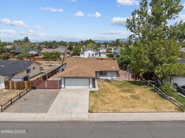 1344 Patricia Dr, Gardnerville, NV 89460 - view of front facade with a residential view, an attached garage, and concrete driveway