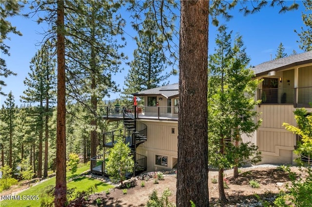 517 Driver Way, Incline Village, NV 89451 - view of side of home with stairs, solar panels, and a balcony