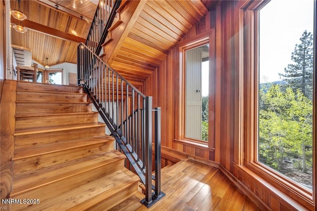 517 Driver Way, Incline Village, NV 89451 - staircase featuring wood-type flooring, wooden ceiling, wood walls, and plenty of natural light