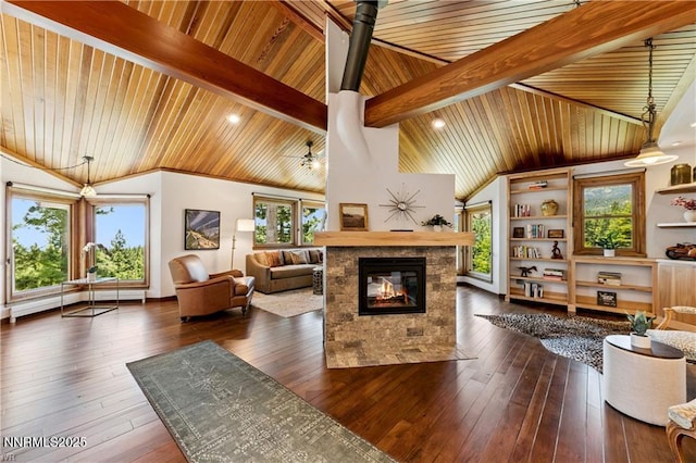 517 Driver Way, Incline Village, NV 89451 - living area featuring wood ceiling, a multi sided fireplace, dark wood-style flooring, and built in shelves